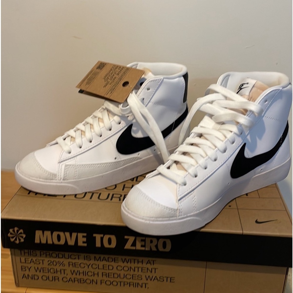 Brand new. Still with tags and box. Nike women’s blazer mid next nature shoes.